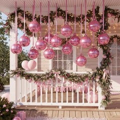 Jenaai wedding or birthday decor with pink balloons adds charm to the venue.