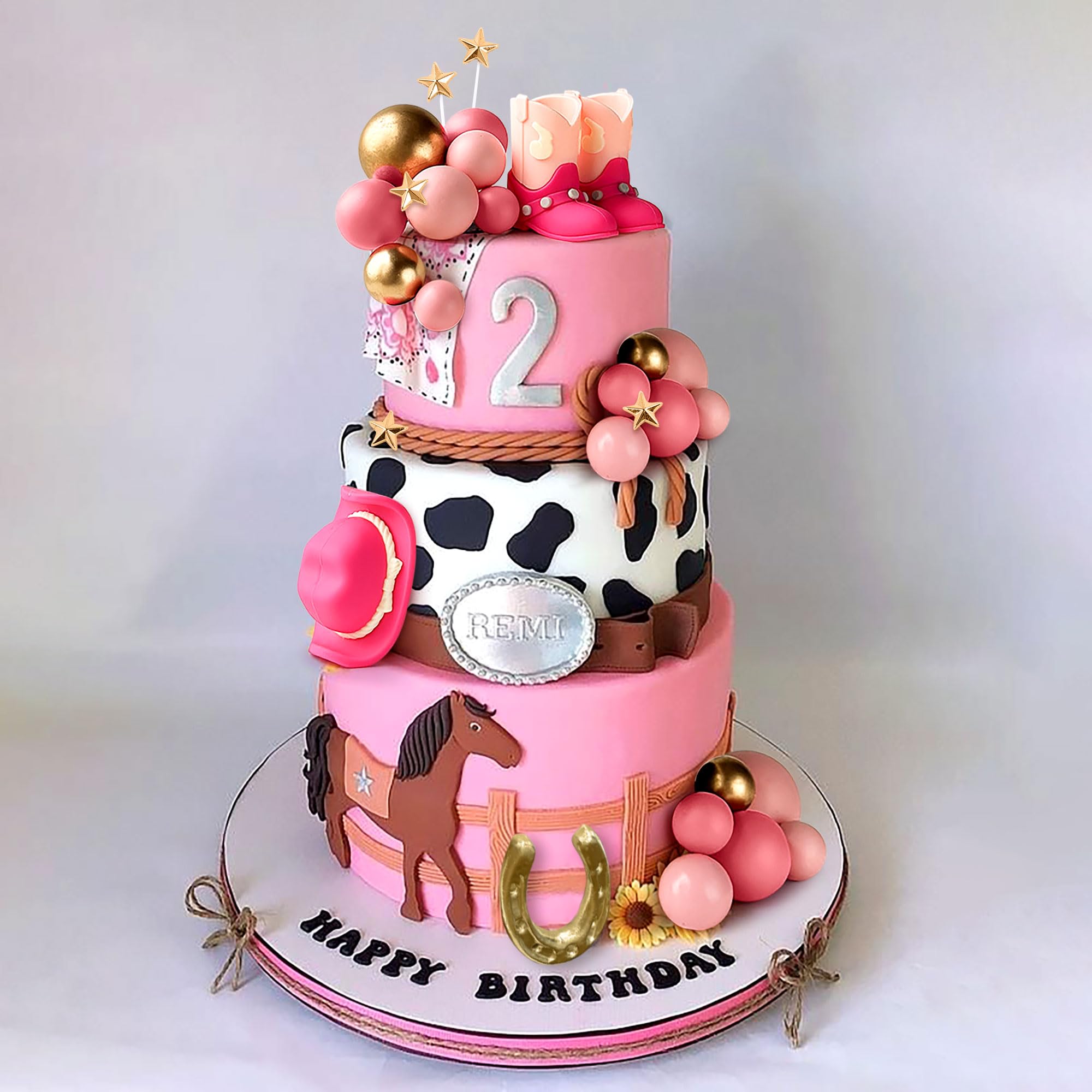 JeVenis dark pink balls cake decor adds bold contrast.