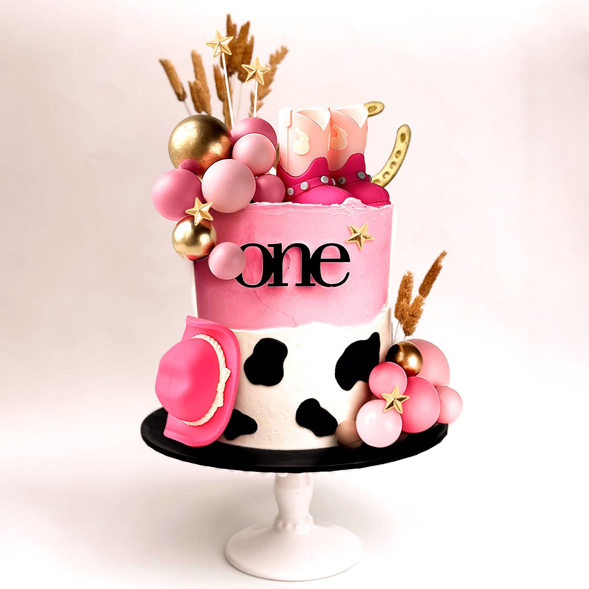 JeVenis gold balls cake decor adds shiny, celebratory accents.