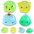 JIAHO dolphin glitter mochi squishy for sensory play and animal recognition.