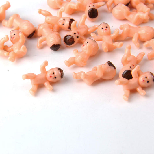 JIAKAI mini babies cake-decoration pieces add charm to desserts.