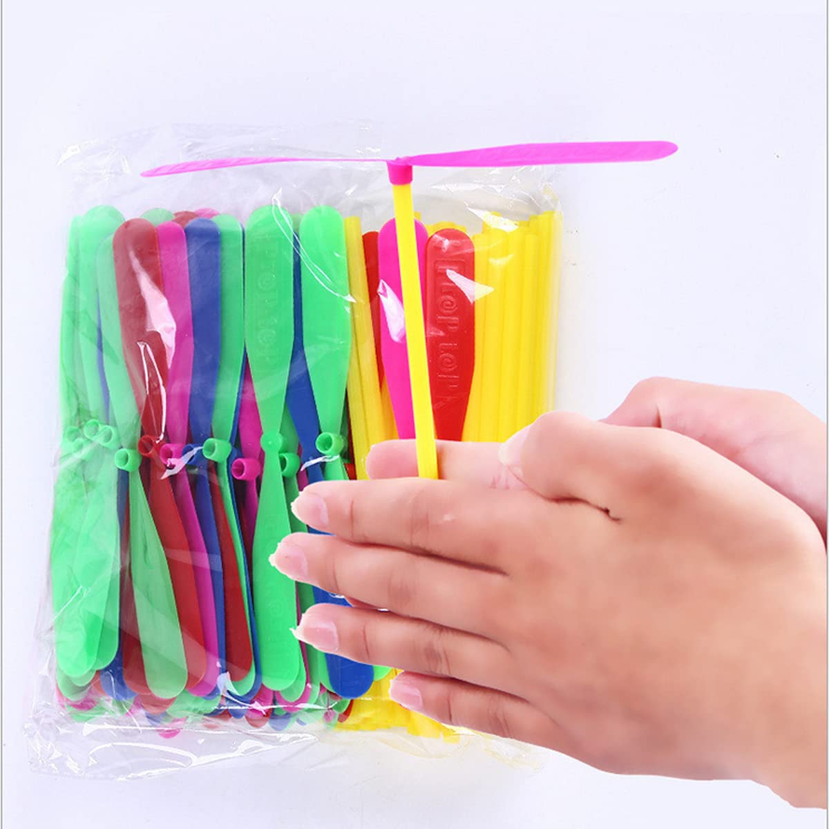 JIEOU flying helicopter set propellers for outdoor play and creative flight experiments.