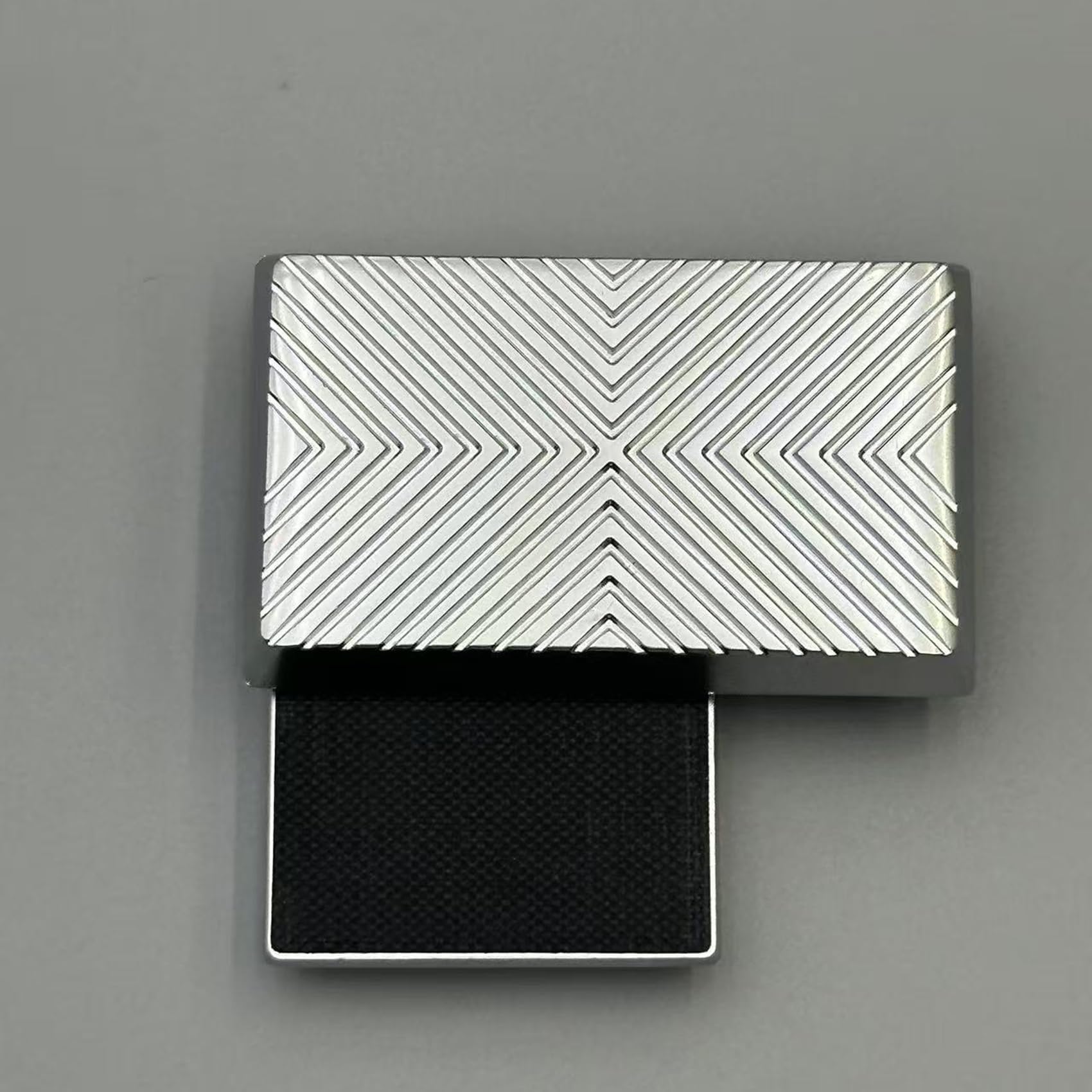 Jiuchuang Infinite EDC Fidget Slider in hand, portable desk companion for focus.