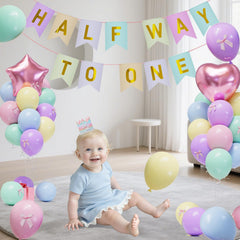 JIUENAGCN pink heart foil balloon adds sweet ambience to a half birthday setup.