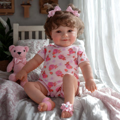 JIZHI smiling reborn doll serves as a friendly display centerpiece and photography prop.