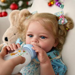 JIZHI blond girl reborn doll in blue floral dress for imaginative play.