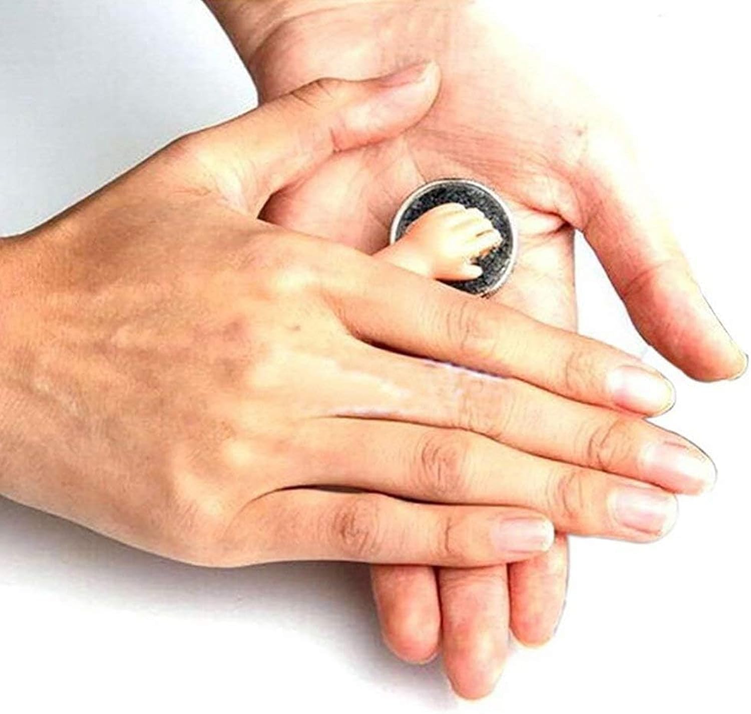 JJLFresheners Little Hand Coin Disappeared Trick Tool in hand for close-up performances