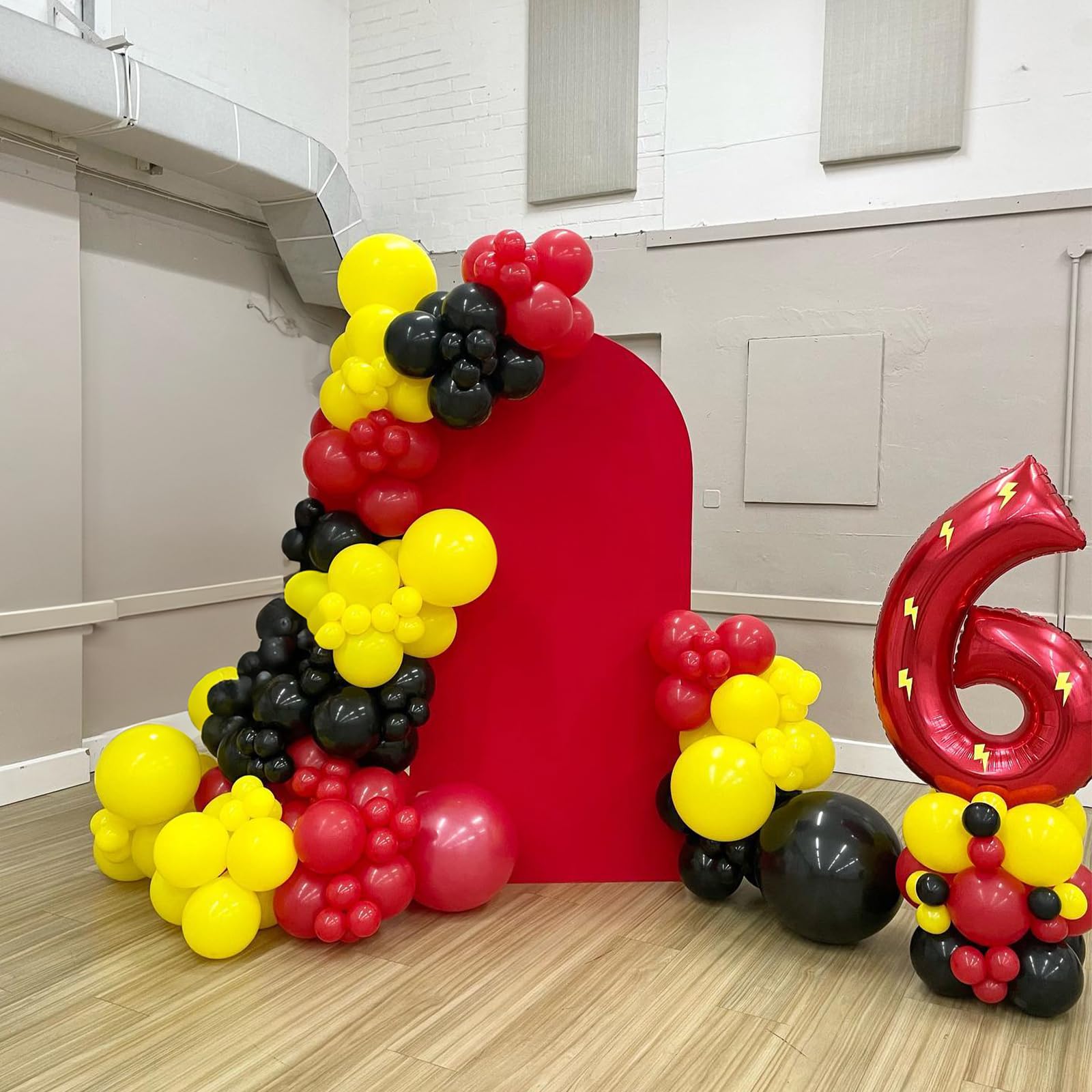 Jobkoo bright red balloons energize any party backdrop with high visibility.