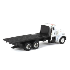 John Deere ERTL Peterbilt flatbed toy truck cabin detail close-up for collectors and kids.