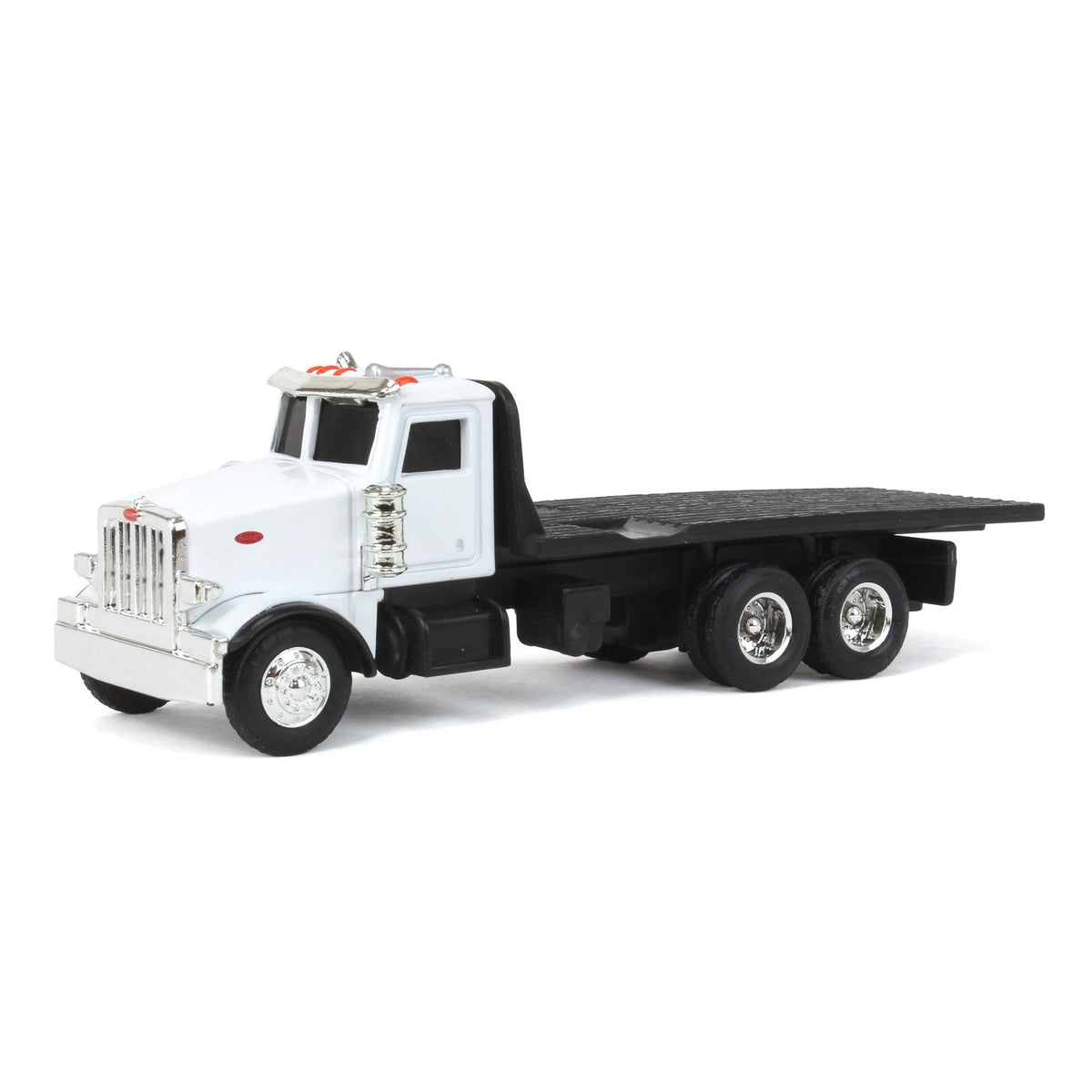 John Deere ERTL Peterbilt flatbed toy truck side view, durable die-cast construction.