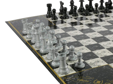 John N. Hansen Chess 4 weighted and felted pieces enhance handling.