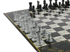John N. Hansen Chess 4 weighted and felted pieces enhance handling.