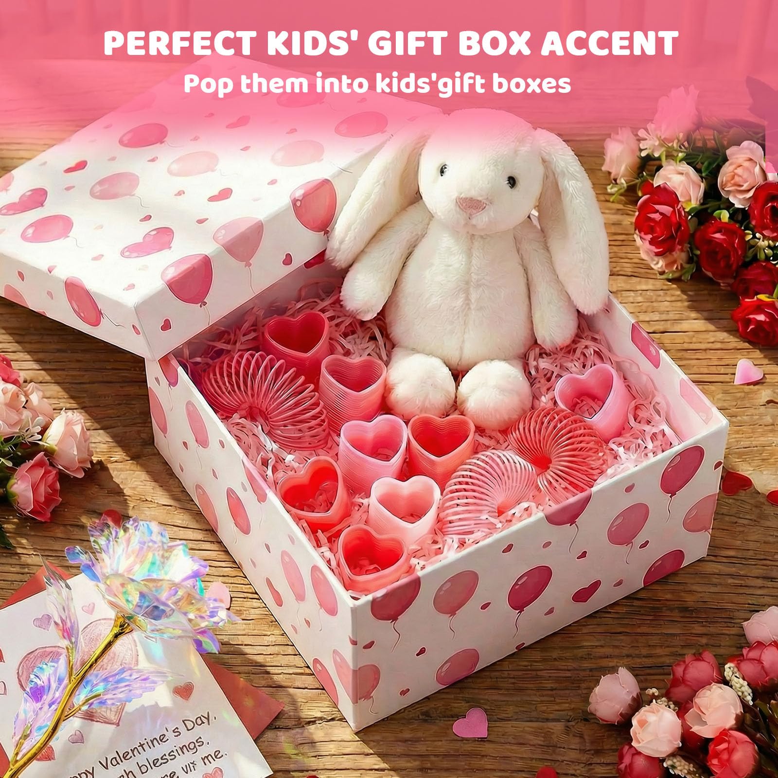 JOHOUSE gift box accent enhances gifting with a festive heart-shaped toy.