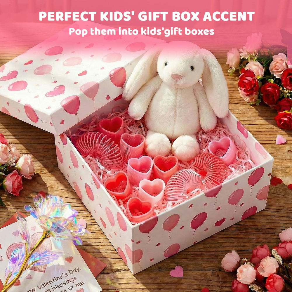 JOHOUSE gift box accent enhances gifting with a festive heart-shaped toy.