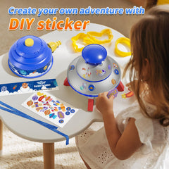 Lighted rocket sprinkles water as kids run and giggle in sunshine.