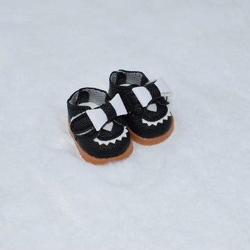 Strap detail and closure on black Labubu-compatible doll shoes by Jojedomo.