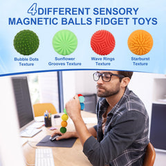 Jollicube silicone magnetic balls in hand for compact fidget on the go