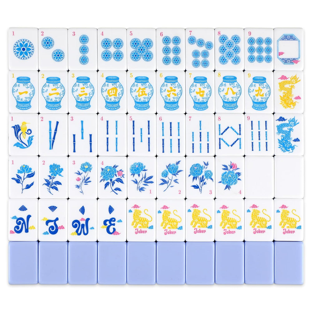 JolliLudo blue acrylic mahjong tiles close-up showing crisp engravings for premium play