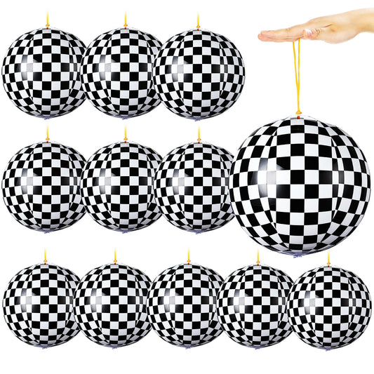 JolliLudo punching balloons in black and white checkered for indoor party fun.