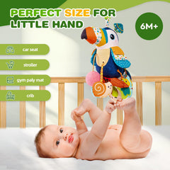 Jollybaby soft-fabric toucan sensory toy for safe baby exploration.