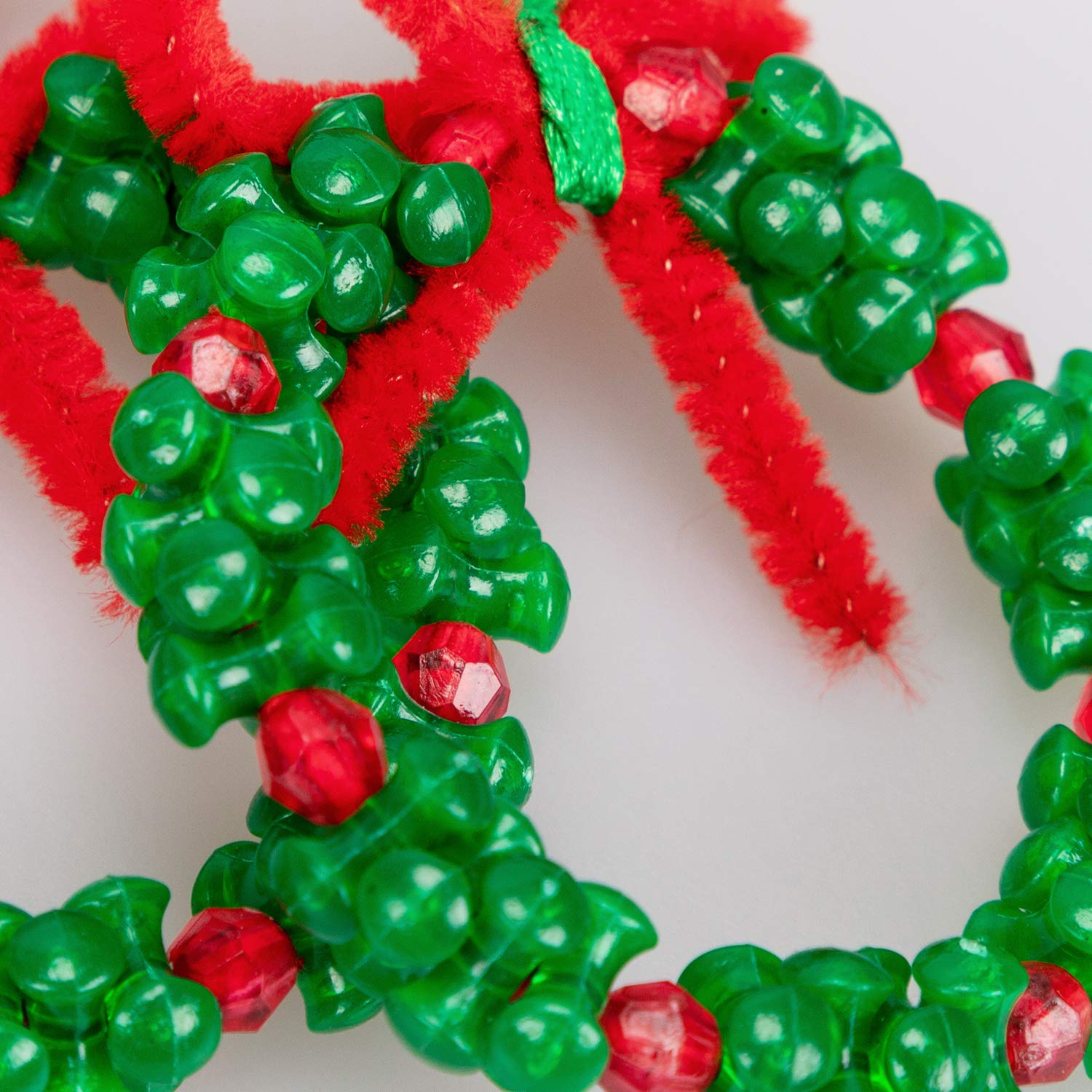 Jollylife bead-stringing guide enabling simple, creative ornament projects.