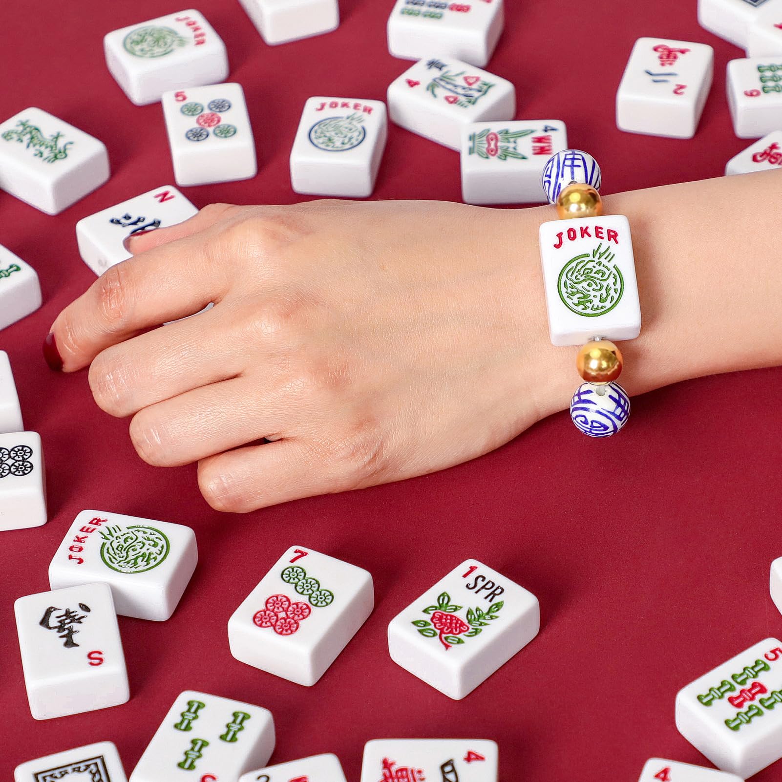 Jongyance blue Mahjong charm coordinates with casual outfits for everyday wear.