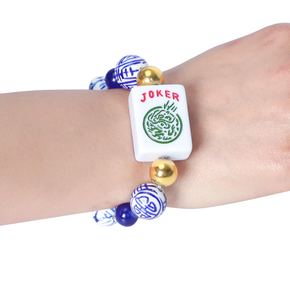 Jongyance elastic cord wrist accessory adjusts from 5.7 to 7.25 inches.