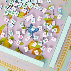 Jongyance versatile mat supports mahjong, poker, dominoes, board games, and more.