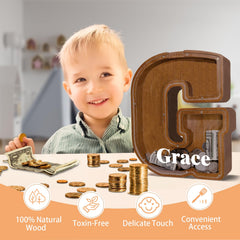 JOOMLAFLY wooden letter piggy bank close-up showing polished edges for safe handling