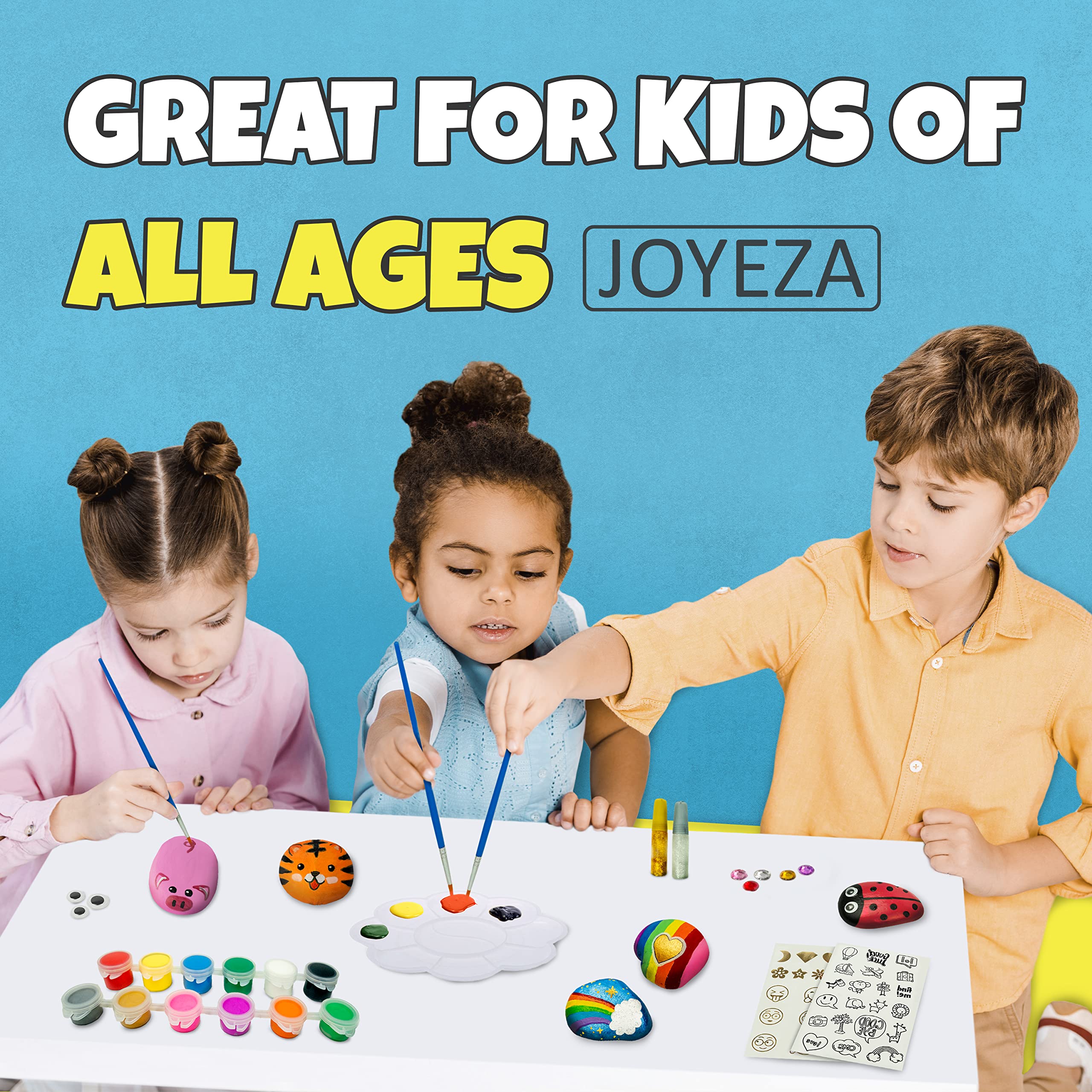 Glitter glue and transfer sheets brighten JOYEZA rock art.