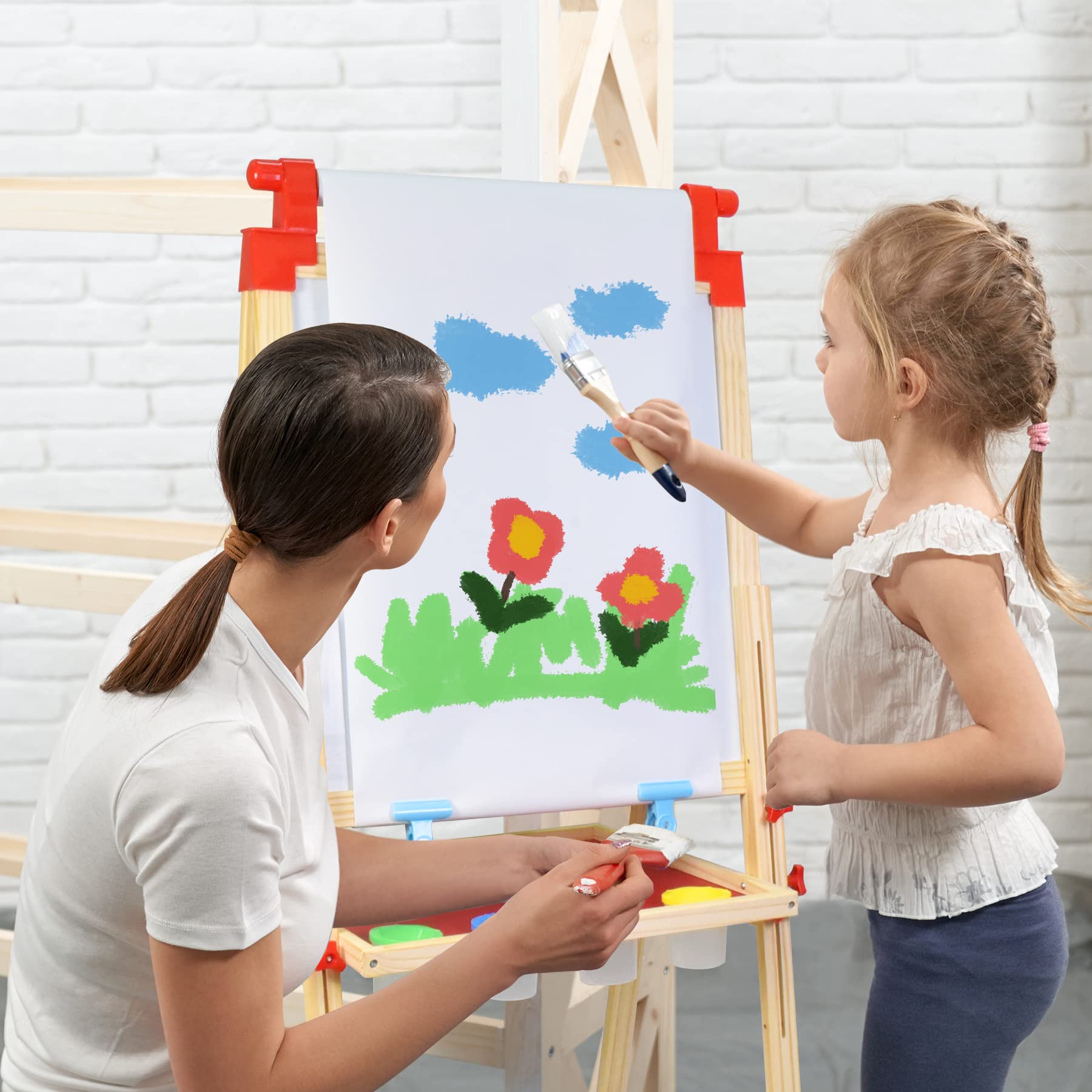 JOYOOSS chalkboard side with paper clips for varying paper sizes.