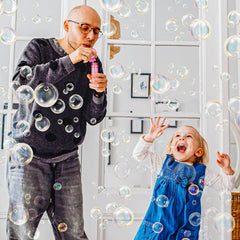 JoyPop bubble wand in child's hand, perfect for quick bubble bursts at playtime.