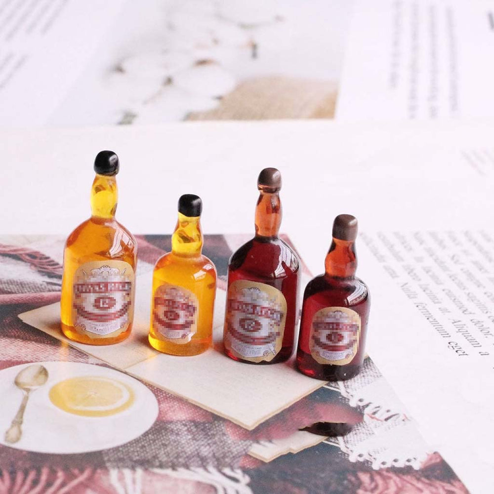 Juland miniature beverage bottles ideal for window displays and small world scenes.