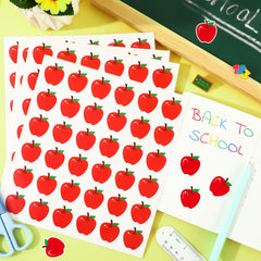 JULMELON laptops and envelopes—apple stickers for quick, fun labeling.