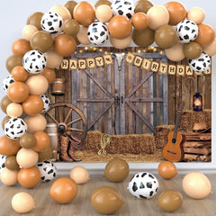 Jumpama cowboy birthday backdrop adds rustic western charm to party photos.