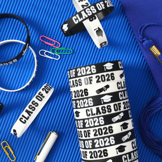 JUNEBRUSHS Class of 2026 bracelet white packaging highlights lasting keepsake for graduates.