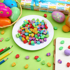 Junebrushes classroom prizes on a desk ready for Easter activities.