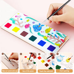 Junqiu US brushes stored in the book pad for mess-free painting on the go.