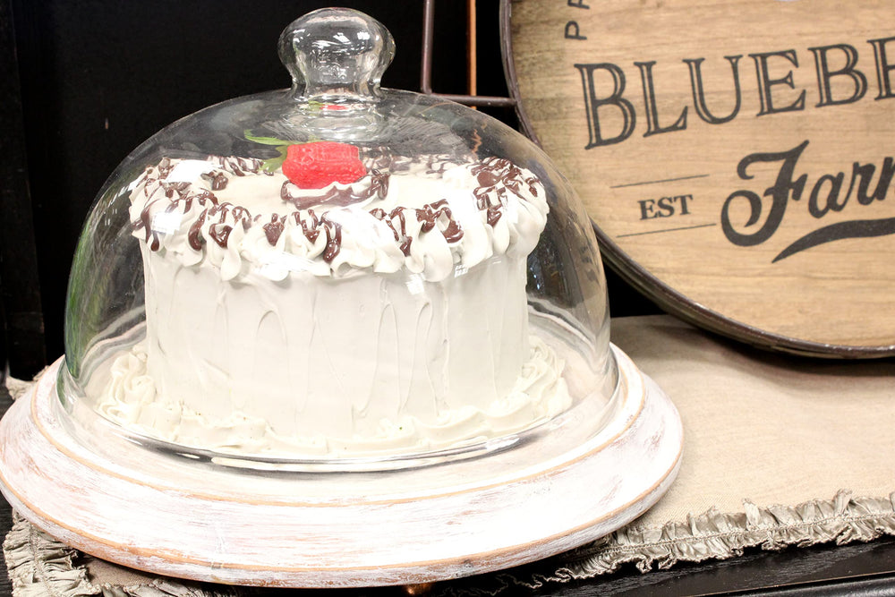 Just Dough It strawberry topper replica on cake prop for authentic visuals.