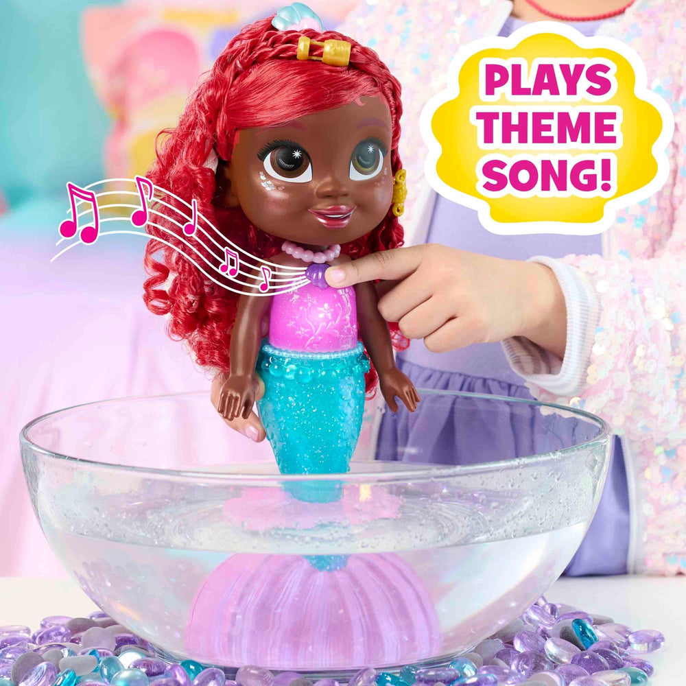 Just Play Ariel Splash & Glow doll lights shimmer as kids pose.