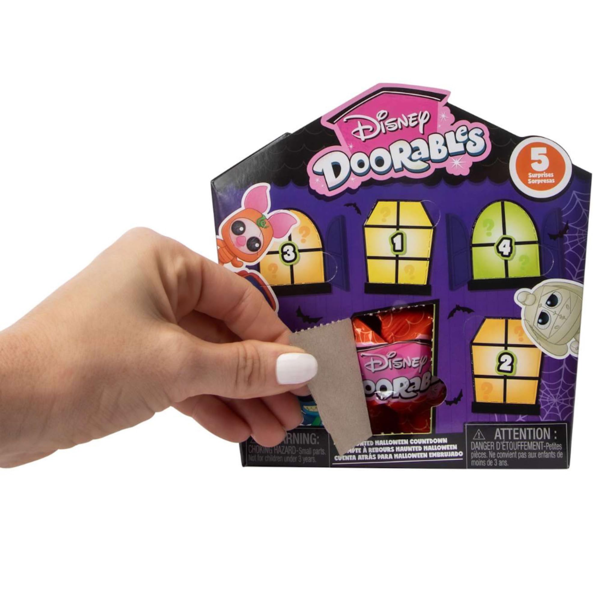 Sticker included in Just Play Disney Doorables Halloween Edition enhances themed storytelling.