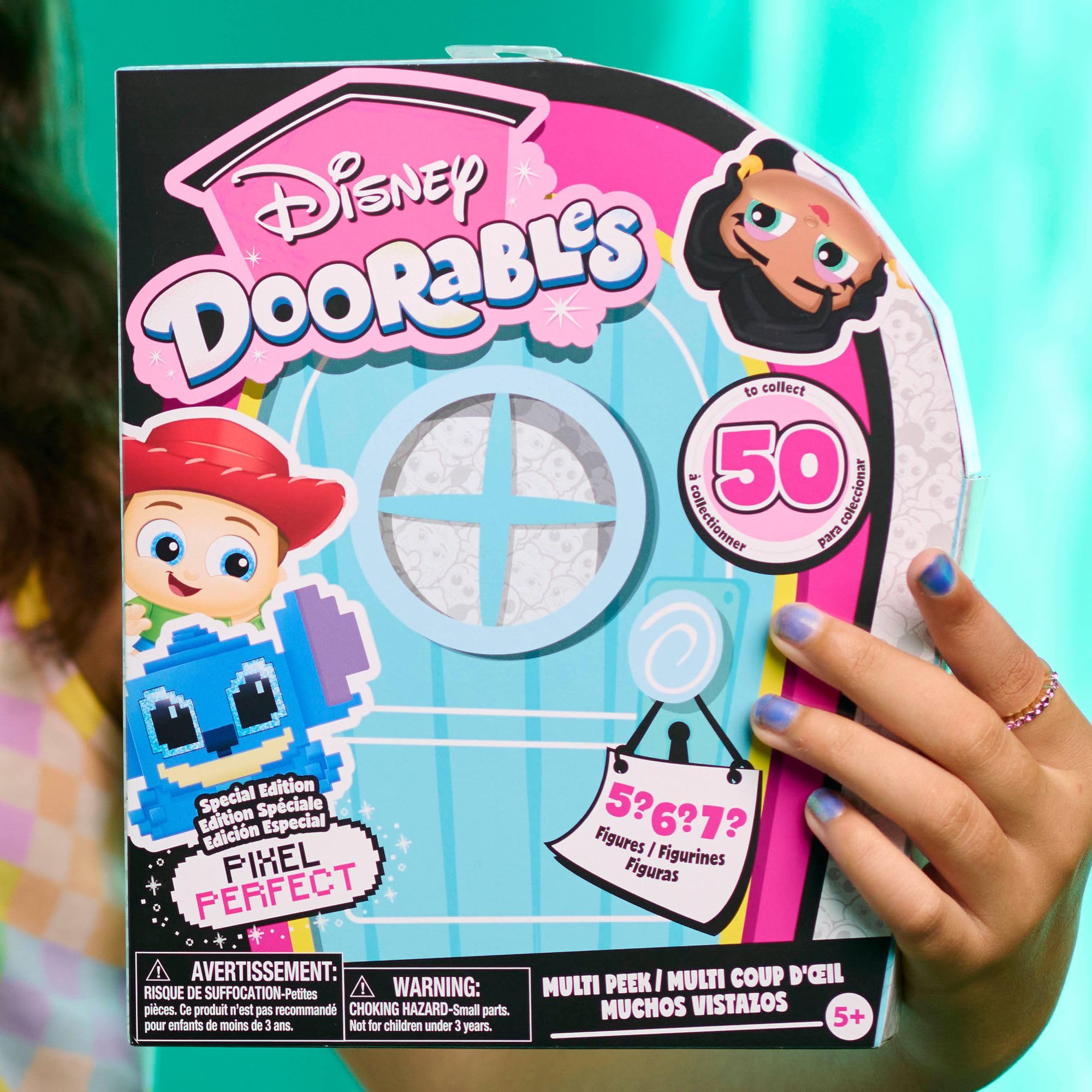 Just Play Disney Doorables 1.5-inch figures in hand for tactile play