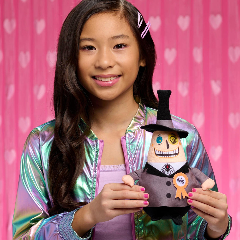 Just Play Mayor plush two-faced back-of-head design sparks imaginative storytelling.