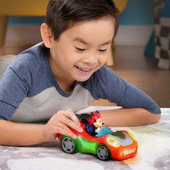 Just Play Mickey Mouse Rev 'n Glow Racer includes batteries for motorized fun.