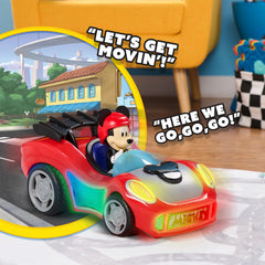 Just Play Mickey Mouse Rev 'n Glow Racer Mickey sits in the driver's seat for familiar roleplay.