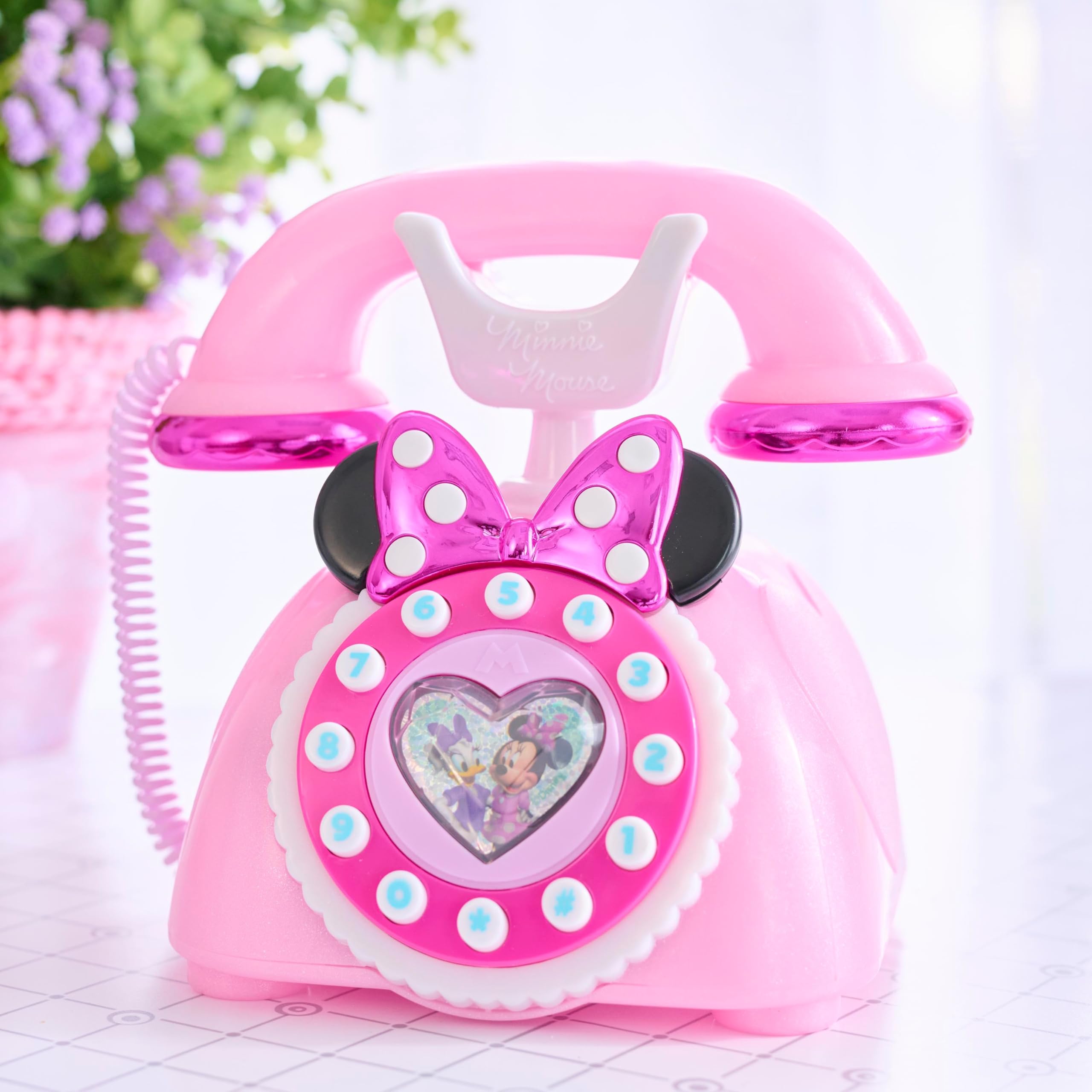 Just Play Minnie Mouse Ring Me Rotary Phone includes 2 AA batteries for immediate play.