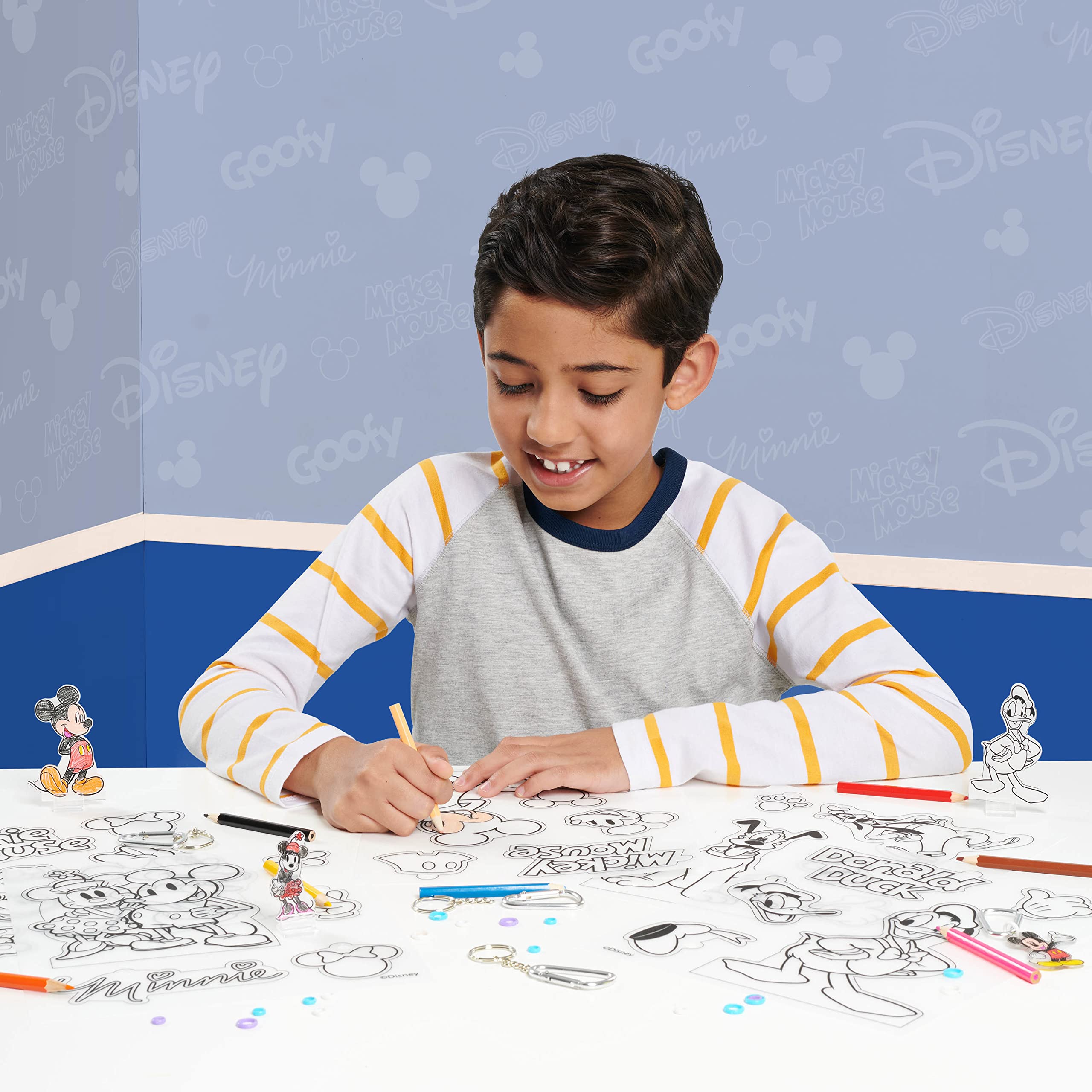 Just Play Shrinky Dinks Disney colored pencils for vibrant artwork.