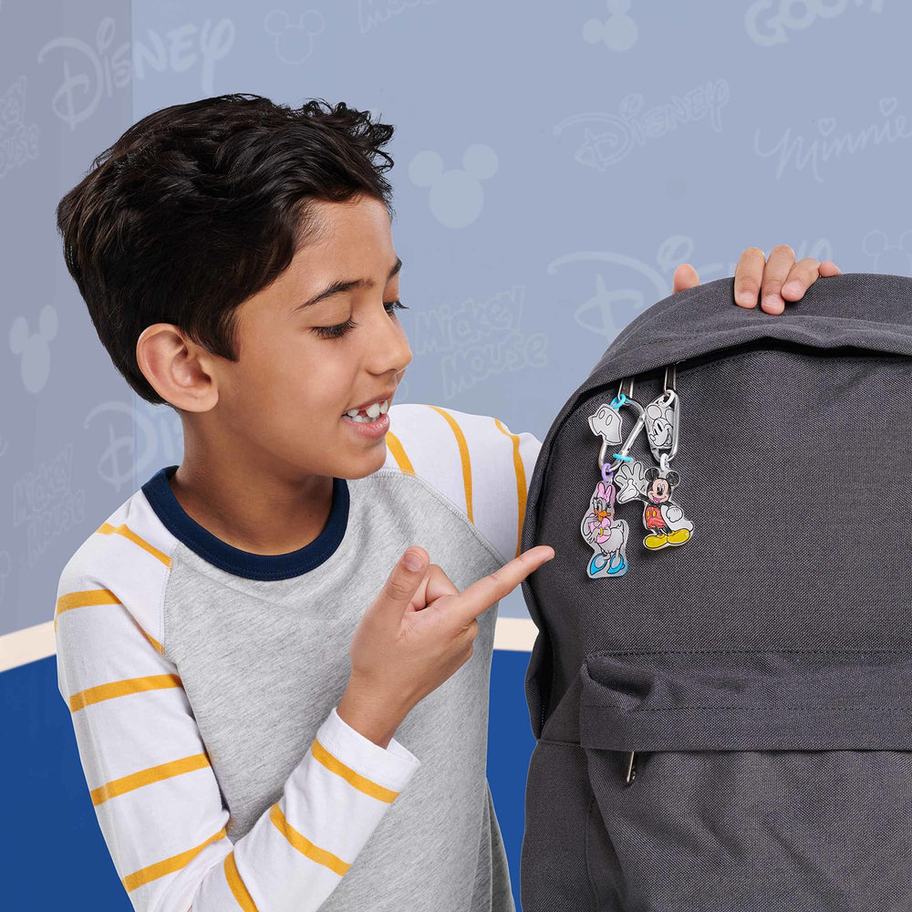 Just Play Shrinky Dinks Disney character stands to display finished figures.