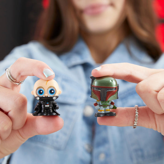 Just Play Darth Vader unmasked exclusive figure highlighted inside the case.