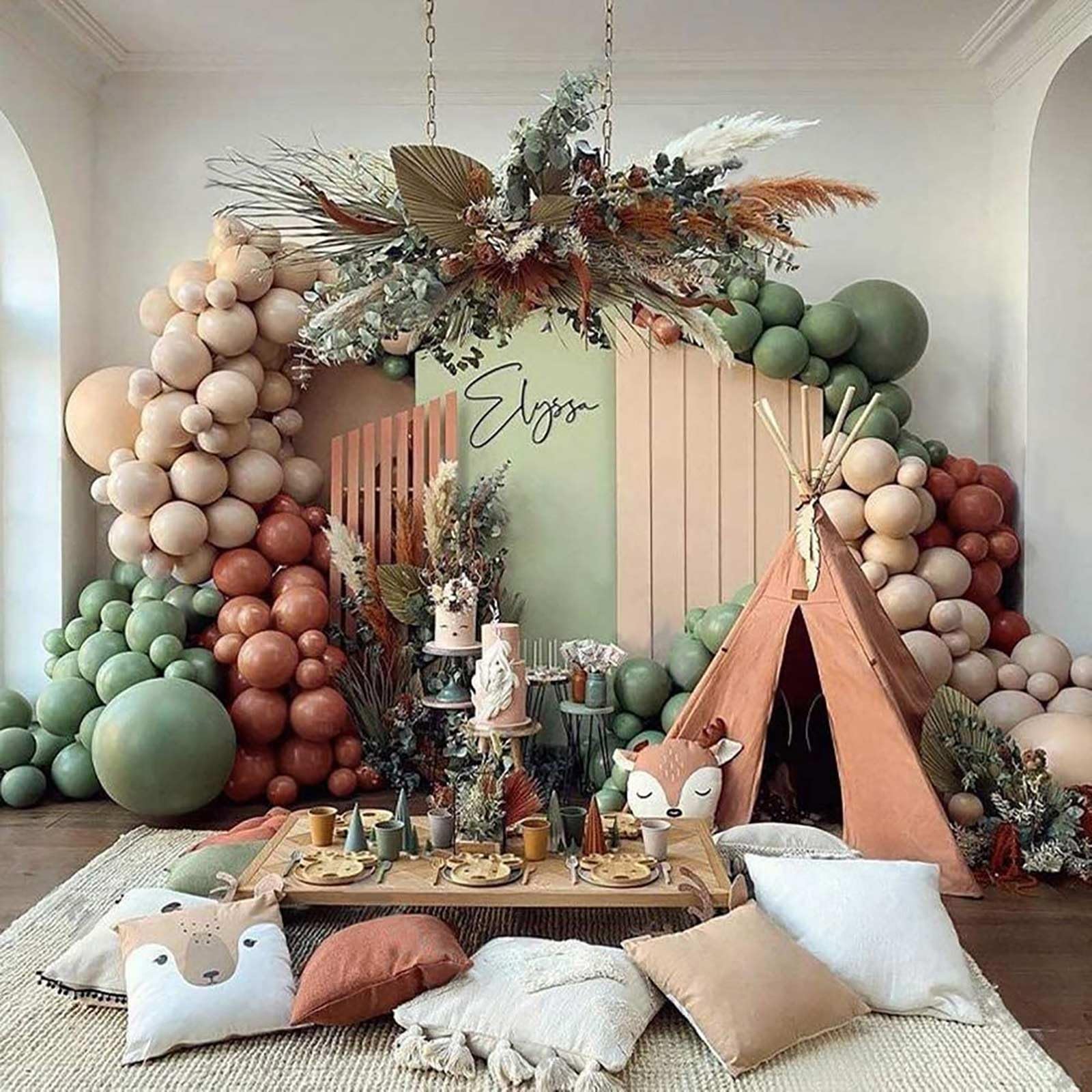 KALOR avocado green balloons forming a centerpiece arrangement